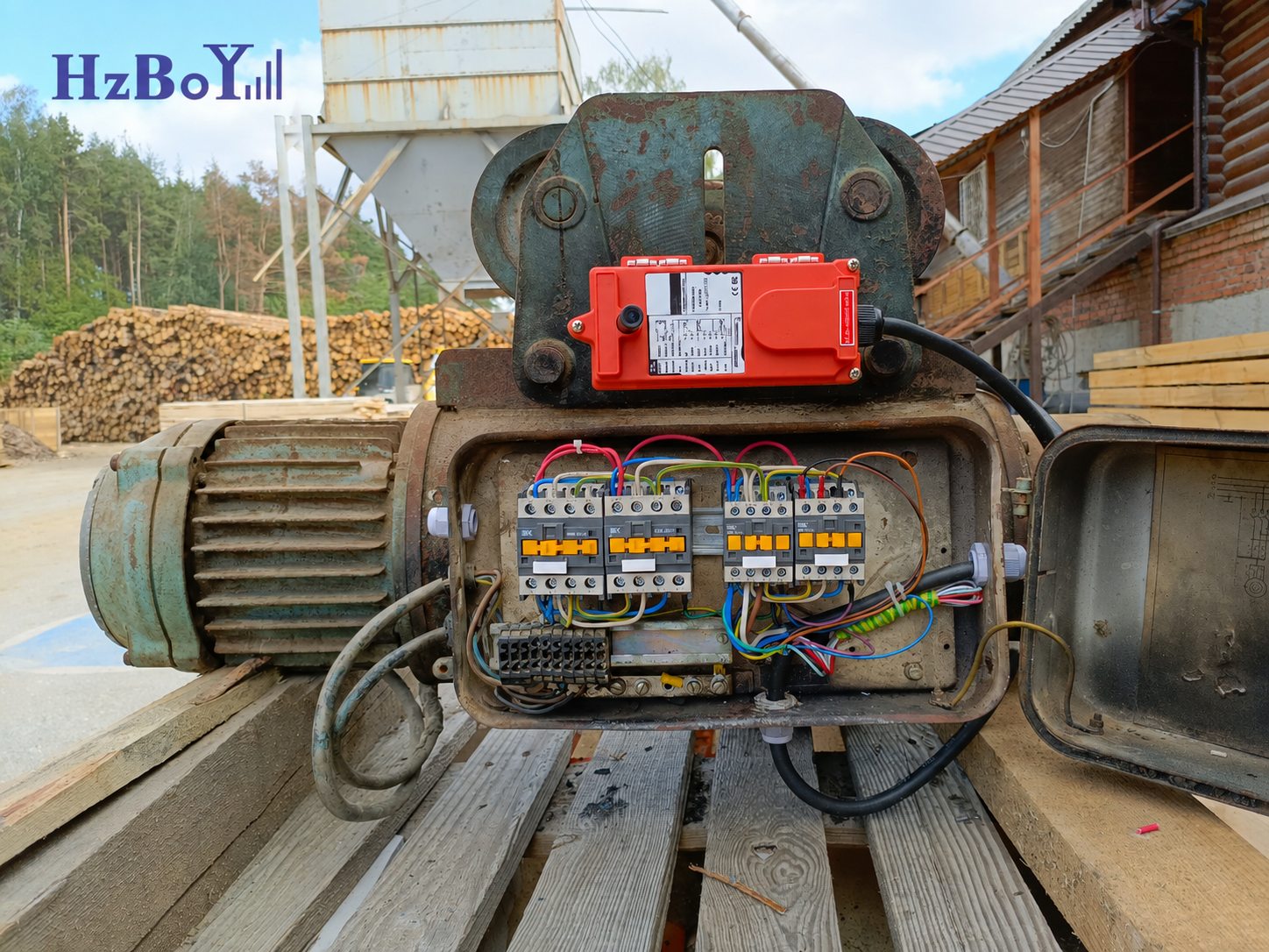 HZBOY industrial remote control receiver installed on a crane control box