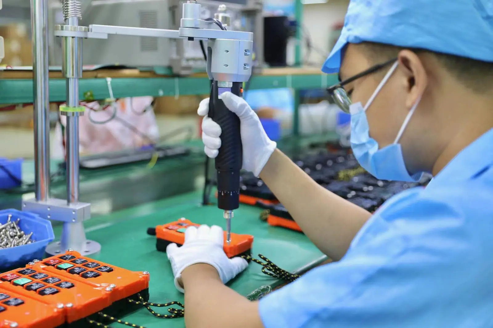 HZBOY technicians assembling industrial radio remote control transmitters